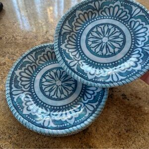 set of four turquoise plates